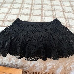 Black cut out flare skirt/bikini bottom size L